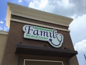 custom storefront cabinet sign