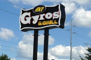 custom storefront pole sign